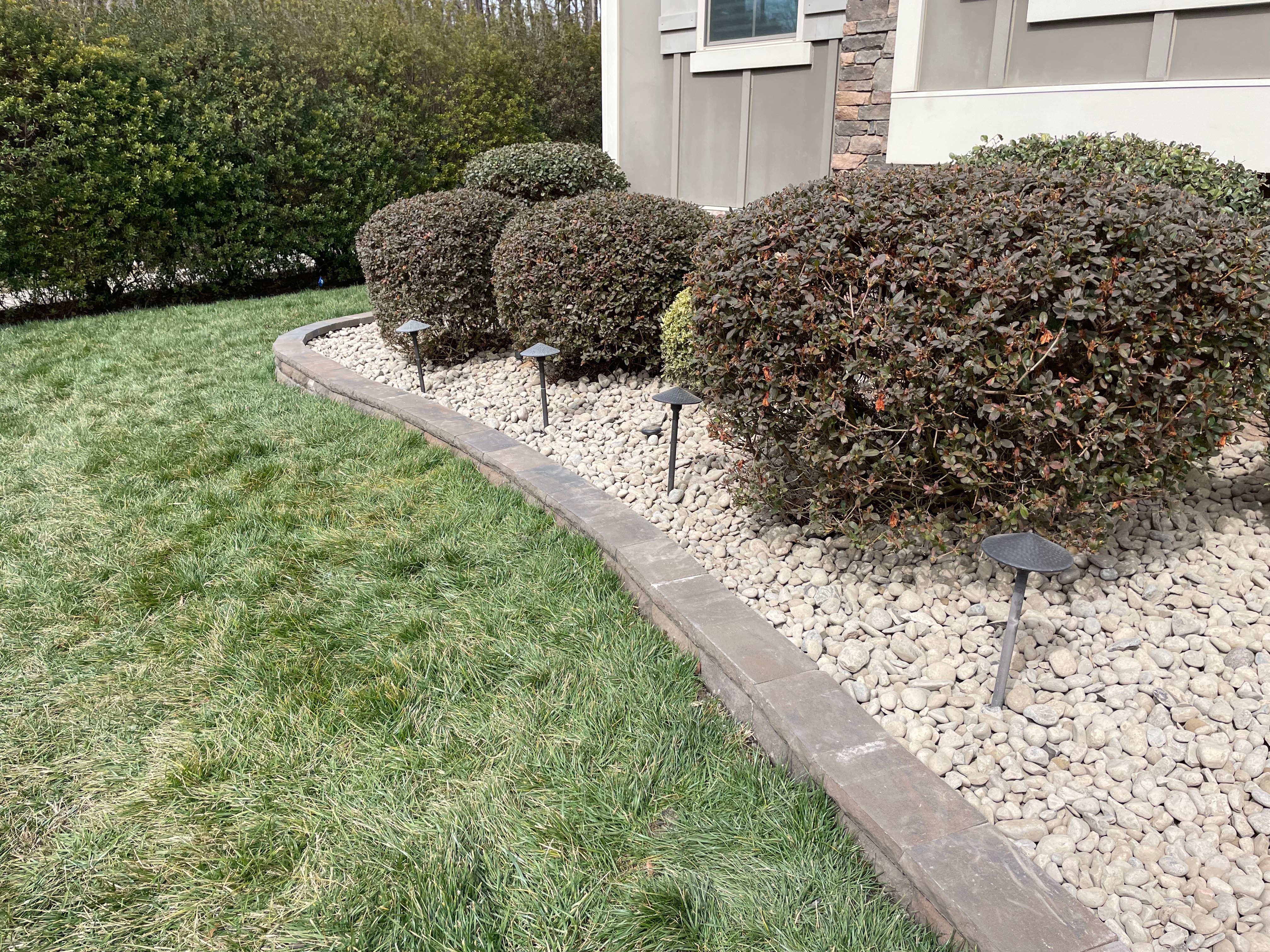 Stone application and shrub maintenance in Raleigh NC